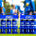 Applied Nutrition energy drinks in blue containers on a sports field