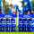 Applied Nutrition energy drinks in blue containers on a sports field